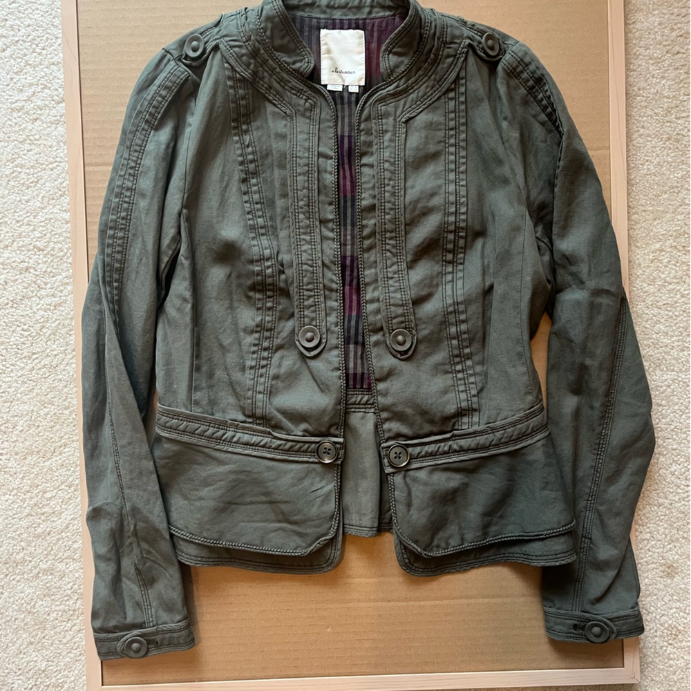 Green Jacket w/ peplum bottom from Anthropologie. Size 8. Like New.